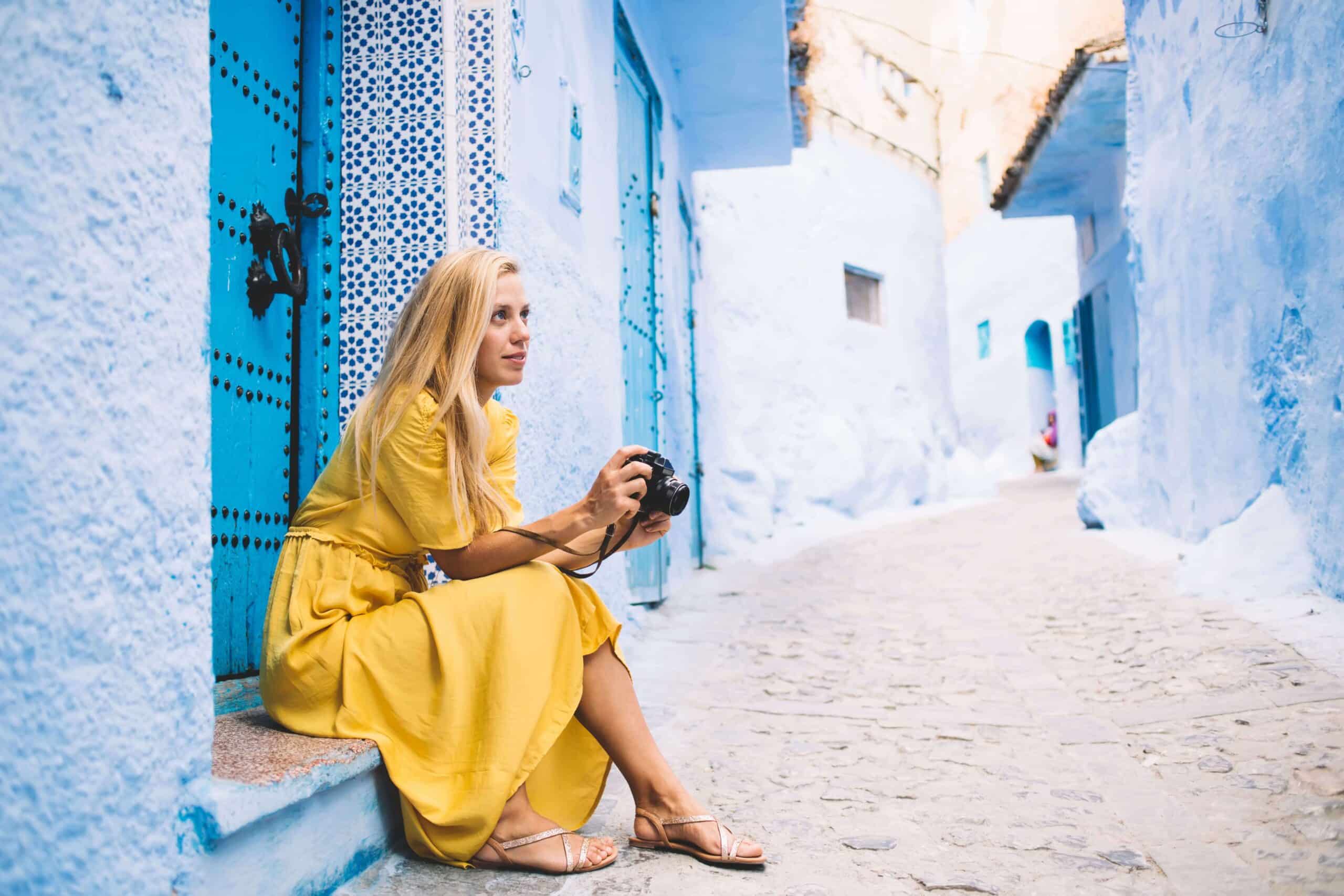 Woman with a camera on a family vacation in Morocco